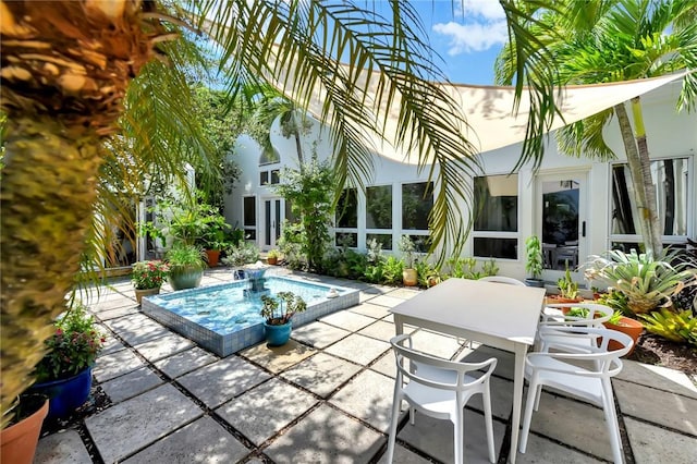 view of swimming pool featuring a patio area