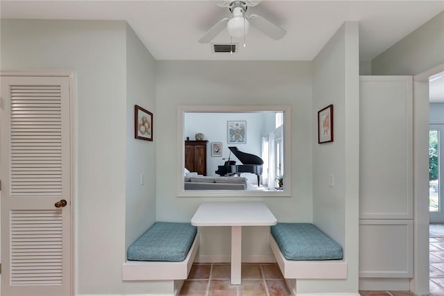 hallway with light tile patterned floors