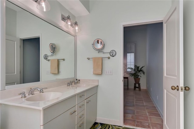 bathroom featuring tile patterned floors and vanity