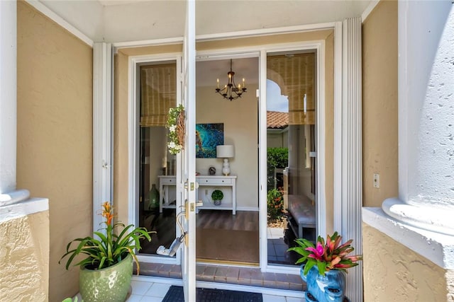 4851 N Newport Island Dr Unit 12A, Vero Beach, FL 32967 - doorway to property featuring stucco siding and french doors