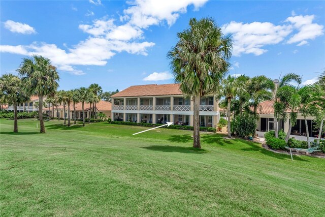 surrounding community featuring a lawn