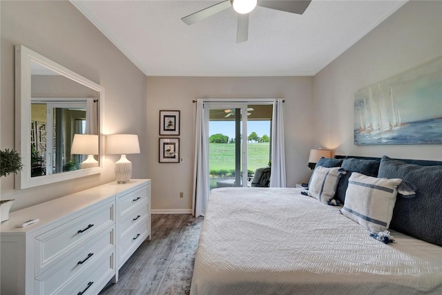 4851 N Newport Island Dr Unit 12A, Vero Beach, FL 32967 - bedroom featuring access to outside, wood finished floors, baseboards, and ceiling fan