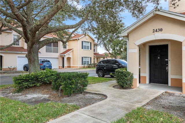 entrance to property featuring a garage