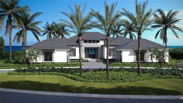 prairie-style house featuring a front yard
