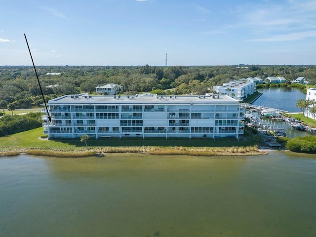 birds eye view of property with a water view