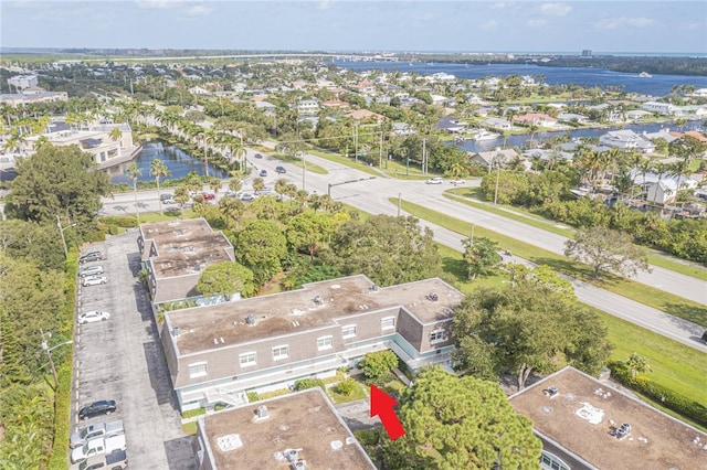 drone / aerial view with a water view