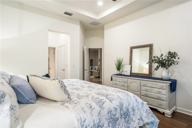 bedroom with wood-type flooring