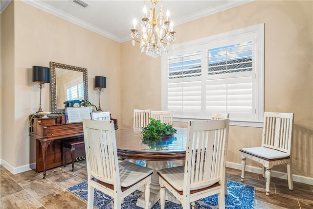 dining room featuring an inviting chandelier and crown molding