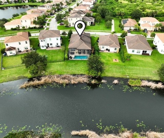 drone / aerial view featuring a water view