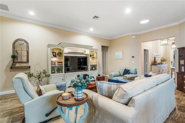 living room with wood-type flooring, an inviting chandelier, and crown molding