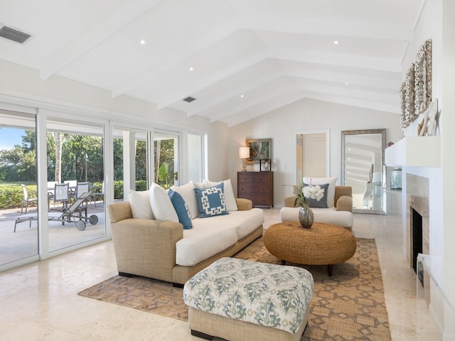 living room with vaulted ceiling with beams, a high end fireplace, and french doors