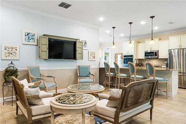 living room featuring light tile patterned floors and ornamental molding