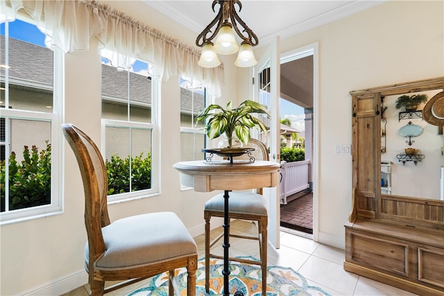 interior space featuring radiator heating unit, light tile patterned floors, crown molding, and a notable chandelier