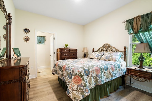 bedroom featuring light hardwood / wood-style flooring