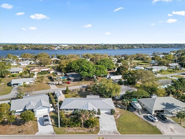 aerial view featuring a residential view and a water view