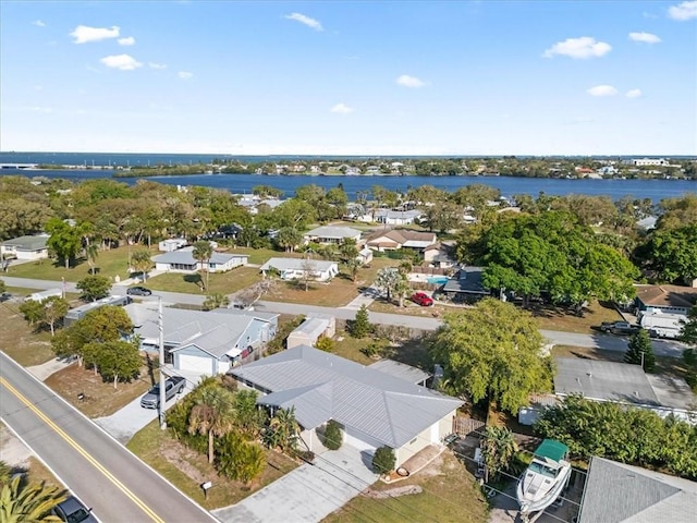 birds eye view of property featuring a residential view and a water view