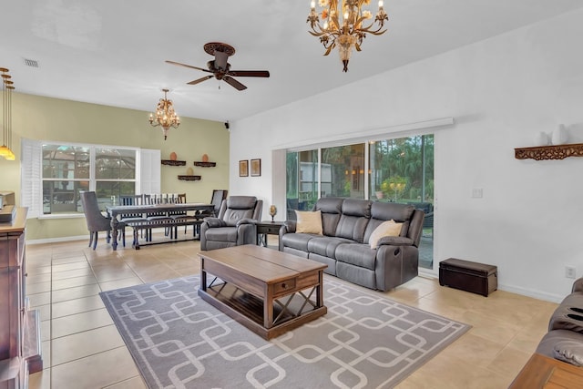 tiled living room featuring ceiling fan