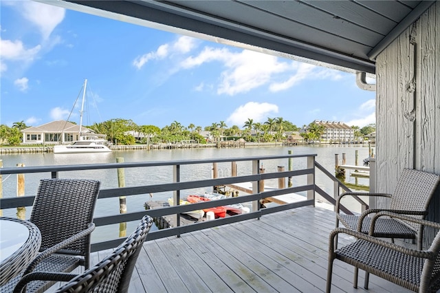 deck featuring a water view