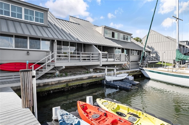 view of dock with a water view