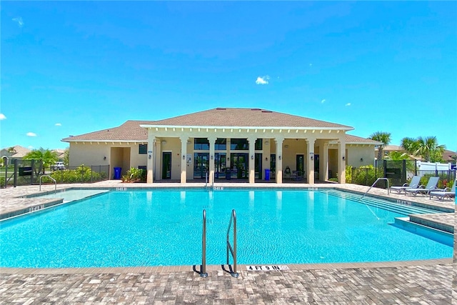 view of pool featuring a patio