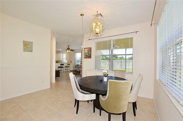 dining room with ceiling fan and light tile patterned floors