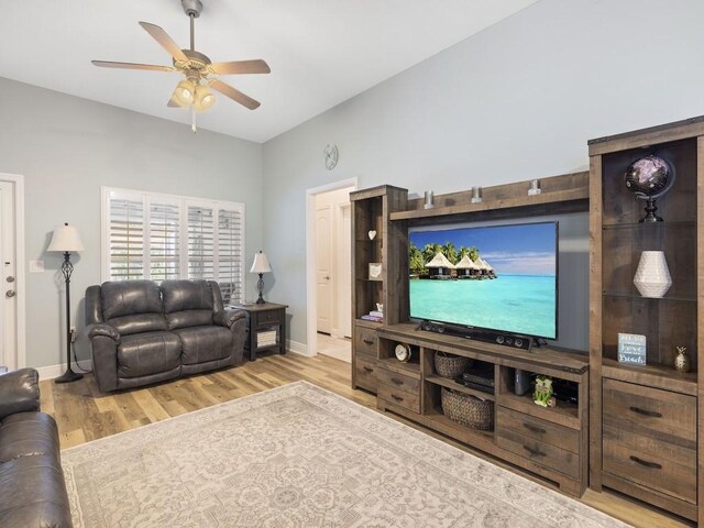 1206 Briarcliff Ct, Sebastian, FL 32958 - living room featuring a ceiling fan, wood finished floors, and baseboards