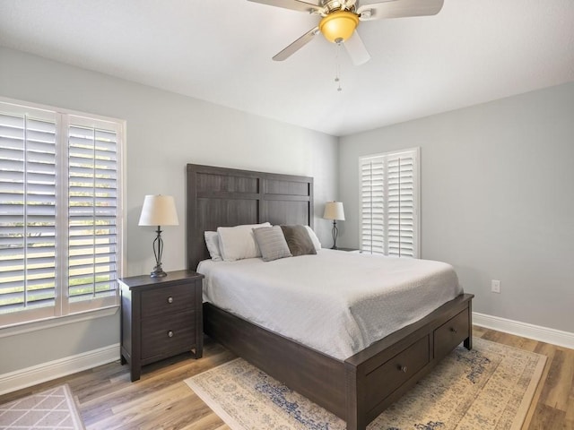 1206 Briarcliff Ct, Sebastian, FL 32958 - bedroom with baseboards, light wood-style flooring, and a ceiling fan