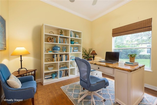 office featuring light wood finished floors, baseboards, and ornamental molding