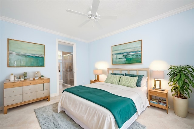 bedroom with ornamental molding, ensuite bath, a ceiling fan, and baseboards