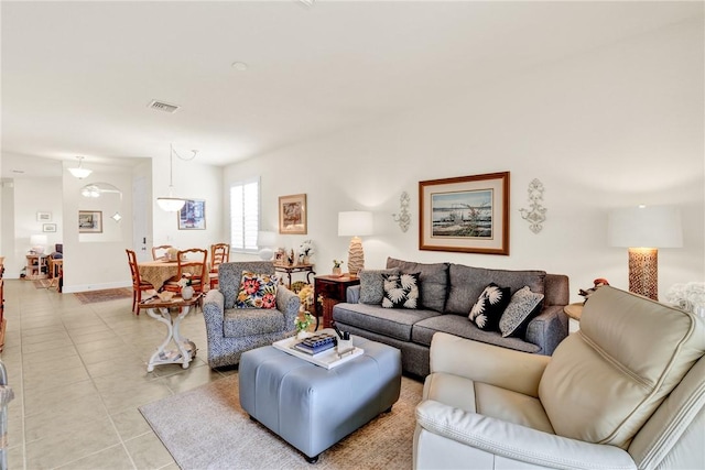 living room with light tile patterned floors