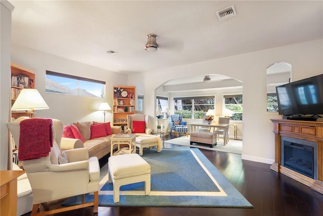 living room featuring dark hardwood / wood-style floors