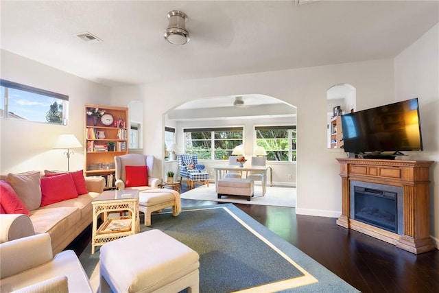 living room featuring dark hardwood / wood-style flooring