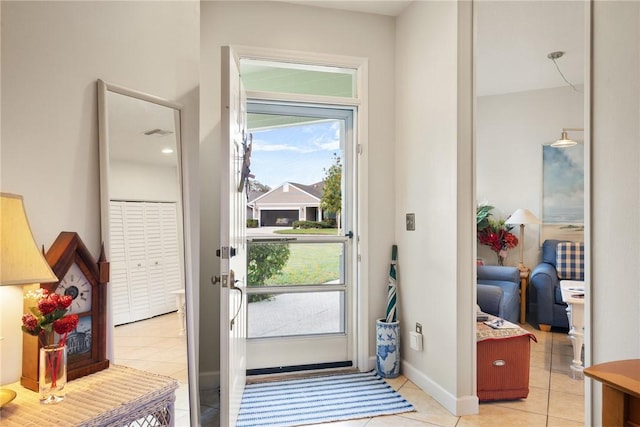 doorway featuring light tile patterned flooring