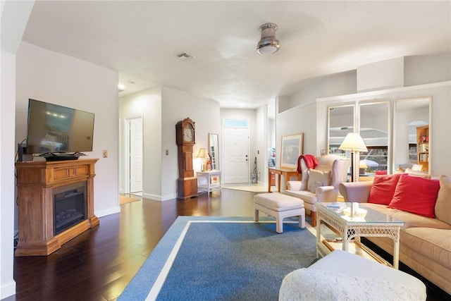 living room with dark wood-type flooring