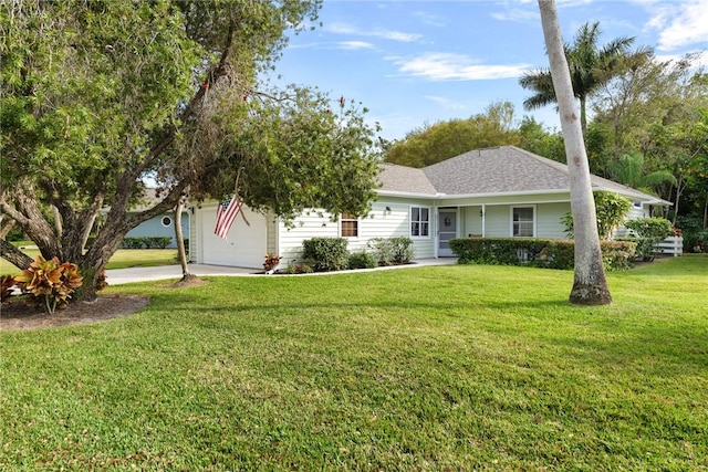 ranch-style home with a garage and a front yard