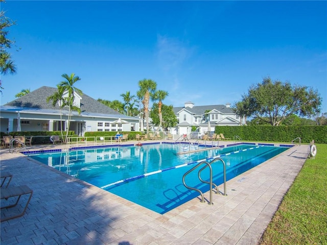 view of pool featuring a patio area