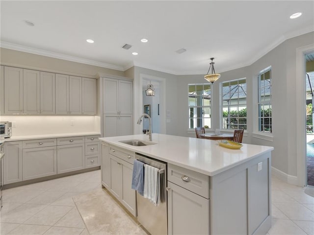 kitchen featuring gray cabinets, sink, hanging light fixtures, stainless steel dishwasher, and a center island with sink