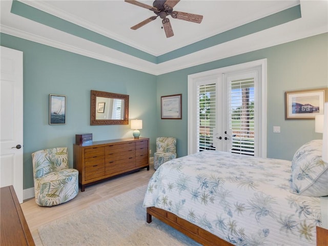 bedroom featuring access to outside, ceiling fan, crown molding, and light wood-type flooring