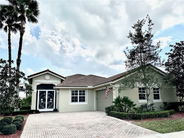 single story home featuring a garage