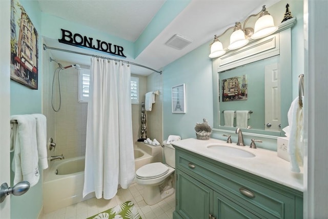 full bathroom featuring vanity, shower / tub combo, tile patterned floors, and toilet