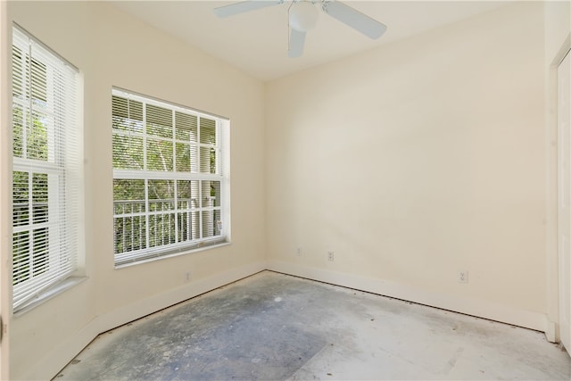 unfurnished room with ceiling fan