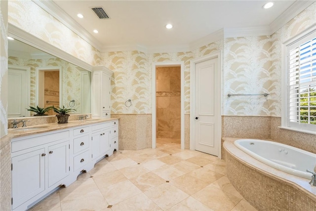 121 Palm Island Ln, Vero Beach, FL 32963 - full bath with wallpapered walls, crown molding, a garden tub, double vanity, and recessed lighting