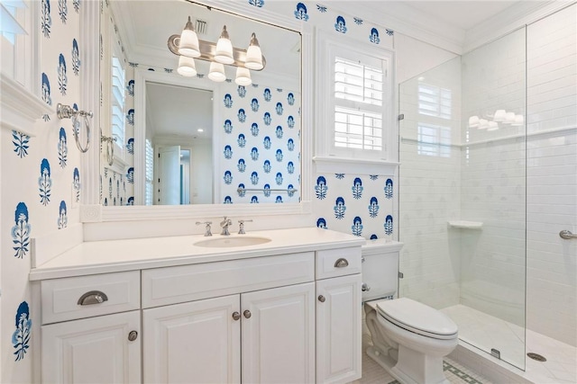 121 Palm Island Ln, Vero Beach, FL 32963 - bathroom with toilet, crown molding, tiled shower, and vanity