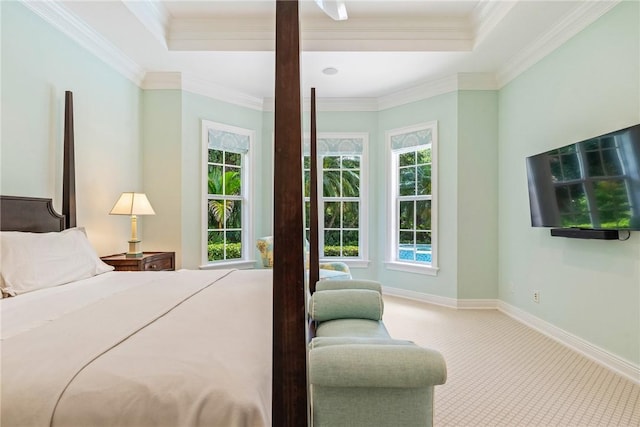 121 Palm Island Ln, Vero Beach, FL 32963 - bedroom featuring carpet flooring, a raised ceiling, ornamental molding, and baseboards