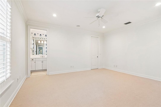121 Palm Island Ln, Vero Beach, FL 32963 - unfurnished room with ornamental molding, ceiling fan, light colored carpet, recessed lighting, and baseboards