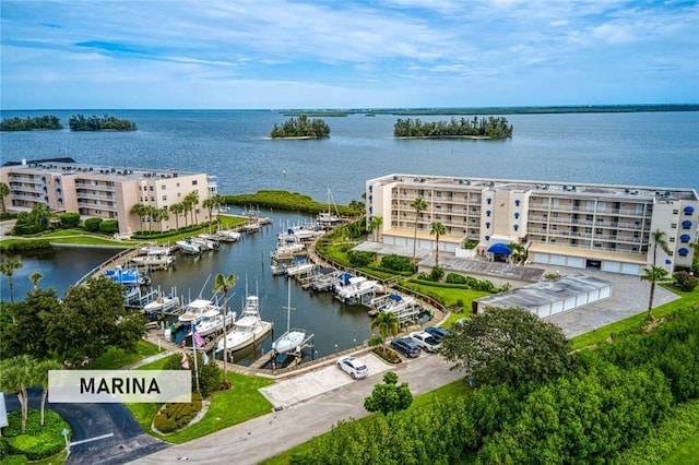 birds eye view of property featuring a water view