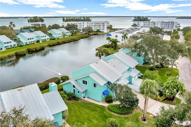 drone / aerial view with a water view