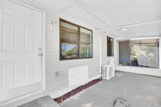 doorway to property with ac unit