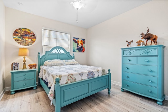 bedroom with light wood-type flooring