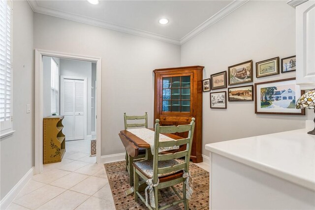 1135 Saint Georges Ln, Vero Beach, FL 32967 - dining area featuring crown molding, light tile patterned floors, and recessed lighting